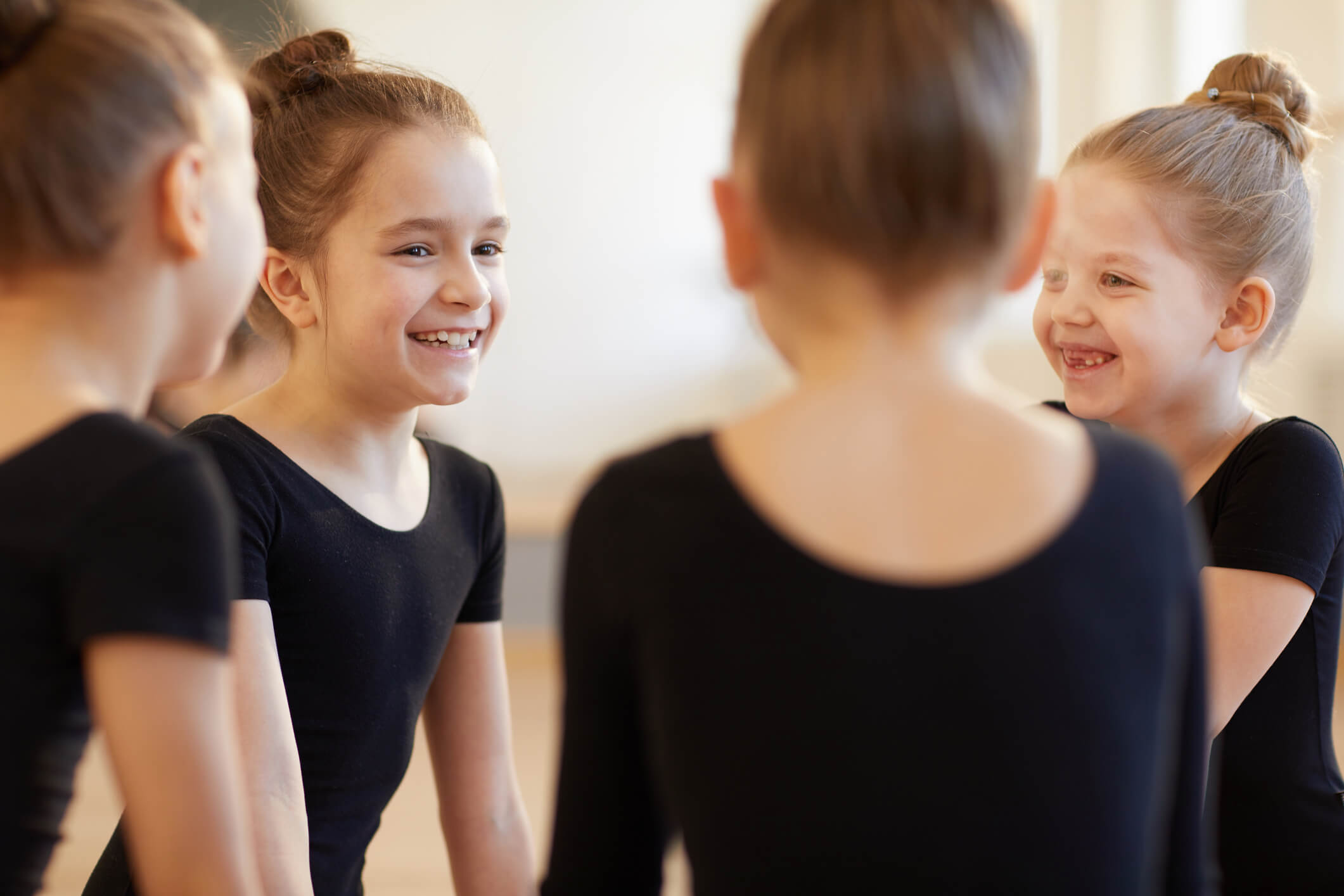Girls Giggling in Dance Class